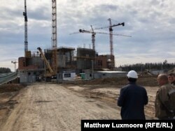 Workers at the construction site of the Armed Forces Cathedral at Patriot Park, outside Moscow