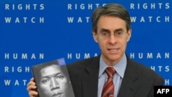 Kenneth Roth, the executive director of Human Rights Watch, presents the findings of the new report during a press briefing in Brussels.