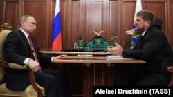 Russian President Vladimir Putin (left) meets with Chechen leader Ramzan Kadyrov at the Kremlin on April 19.