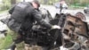 WATCH: Ukrainian government and Russia-backed separatist forces traded accusations about responsibility for a deadly shelling of civilians on a roadway near Donestsk. Local authorities reported at least five people died near a checkpoint in the separatist-controlled area.