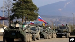 Russian peacekeepers park at a checkpoint on a road in Nagorno-Karabakh in November 2020.