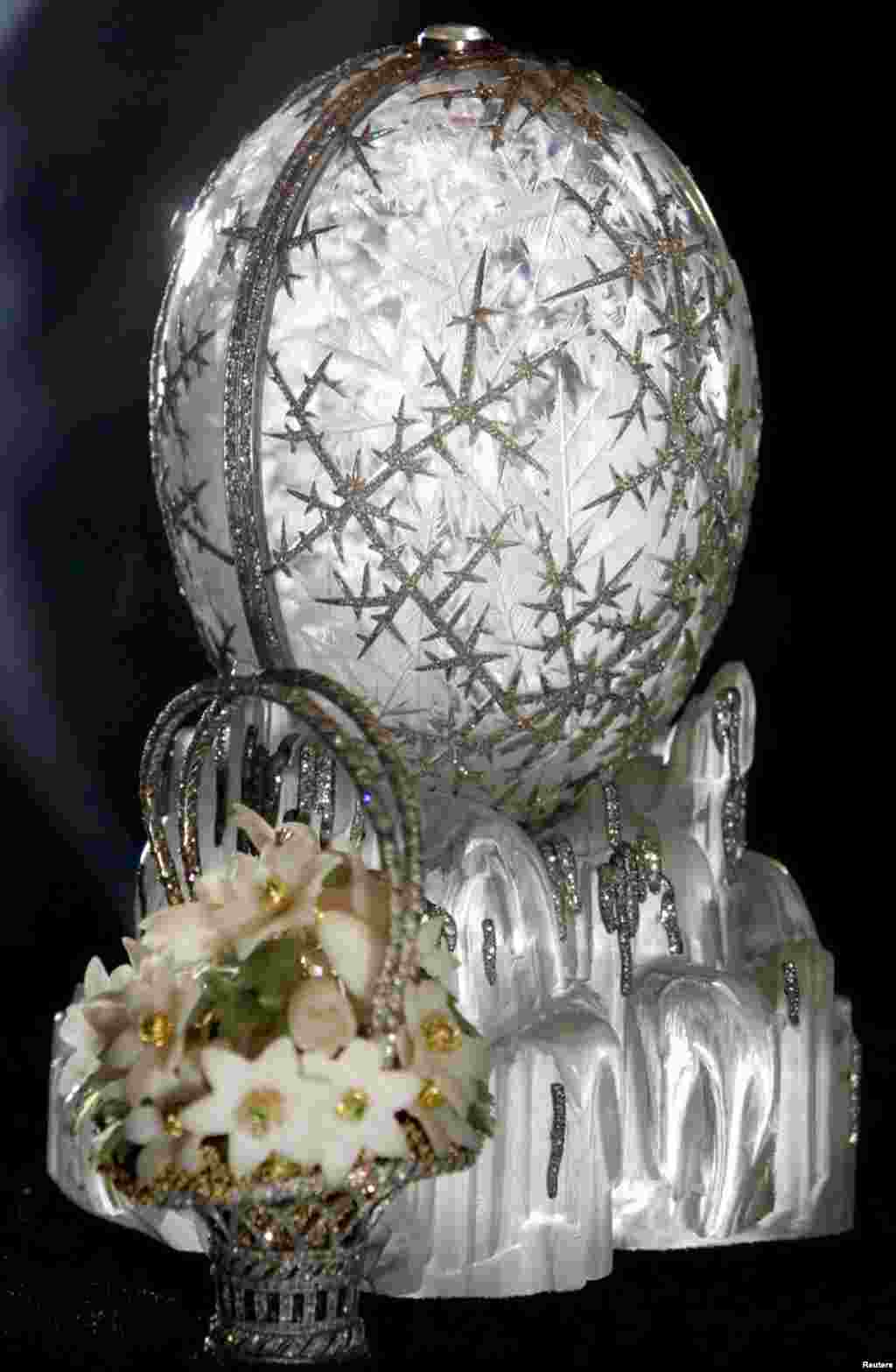 Over the next three decades, Carl Faberge would create another 49 eggs for Russia's last two tsars. Pictured is the Winter Egg, one of his most famous, crafted from rock crystal and etched with platinum and diamonds to resemble frost. The 14-centimeter egg opens to reveal a bejeweled basket of spring flowers.