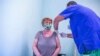A woman receives the Russian Sputnik V vaccine at the South Pest Central Hospital in Budapest on February 12.