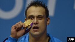 Weightlifter Ilya Ilyin attributes his success to an unorthodox diet.