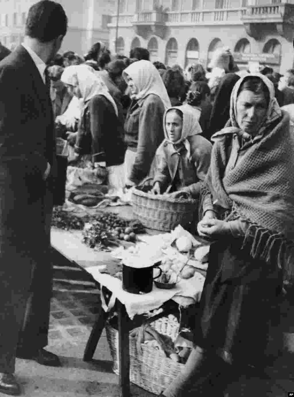 A Belgrade market in 1950, when tensions with the Soviet Union led to a trade blockade, food shortages, and fears of a military invasion. Tito at the time carried out ruthless repressions against those deemed sympathetic to the Soviet Union. Hundreds were killed in the political crackdown and thousands more sent to forced-labor camps. 