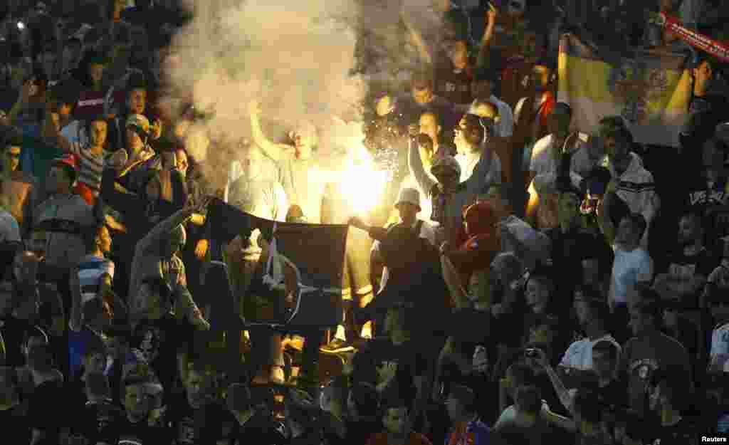 Serbian emotions were high, with fans burning a NATO flag in the stands during the action. As a precaution, no Albanian fans had been allowed to attend the match.
