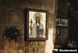 An image of St. Nino with her grapevine cross inside the Jvari Monastery, near Tbilisi.