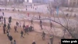 Rights groups have criticized the Kazakh government for its response to December riots in the Western oil town of Zhanaozen, as purportedly shown in this YouTube screen grab.