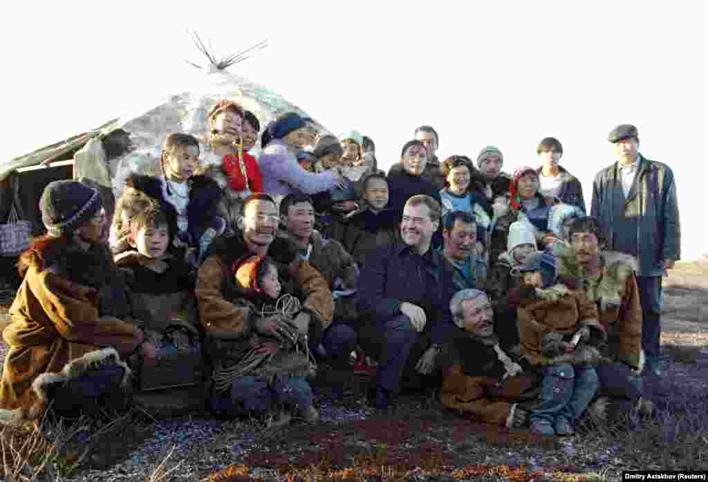 On September 23, 2008, Medvedev poses with reindeer herders in the town of Kanchalan in Russia's Chukotka region.