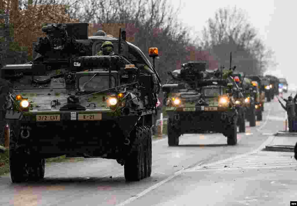 Vehicles of the "Dragoon Ride" on their way to a Czech army barrack in Prague on March 30