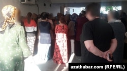 People line up to buy food at a state grocery store in Ashgabat last month.