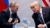 Американскиот претседател Доналд Трамп со неговиот руски колега Владимир Путин 