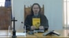 Romania Judge Cristi Danilet poses with his book The Student And The Law. (file photo)