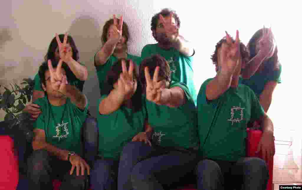 Key members of the Network of Young Iranians in Berlin, dressed in the movement's signature green.