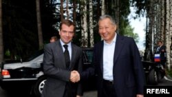 Russian President Dmitry Medvedev (left) is greeted by his Kyrgyz counterpart, Kurmanbek Bakiev, at the CSTO summit in Cholpon-Ata in late July.