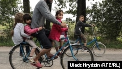 Dalkhan's famly seem to have adapted well to their new surroundings and his wife says their kids now speak fluent Belarusian.
