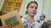 Poroshenko Says Sister Of Jailed Ukrainian Pilot Savchenko Is Back In Ukraine