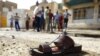 Suicide Bombers Kill 16 At Baghdad Mosques