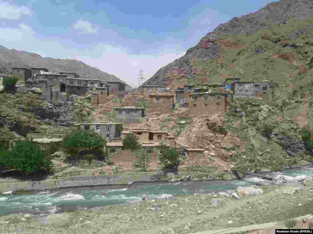 A typical Afghan village, where houses are built on hilltops from stone, clay, or concrete. 