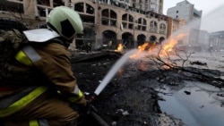 Sirens Wail, A Child Flees For Safety, As Russia Bombs Kyiv (Video)
