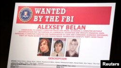 An FBI wanted poster featuring suspected Russian hackers 