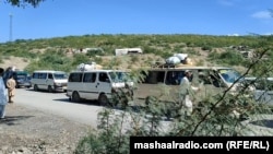 A convoy moves under police escort in Kurram district earlier this month. 