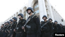 Kyrgyz security forces in Bishkek stand in formation during preparations for heightened security measures ahead of a presidential election in the Central Asian country in 2011. 