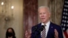 U.S. President Joe Biden delivers a foreign policy address as Vice President Kamala Harris listens during a visit to the State Department in Washington on February 4. 