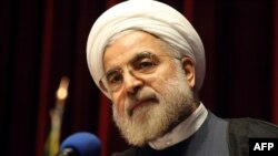 Former top nuclear negotiator Hassan Rohani addresses a ceremony in Tehran in April where he announced his candidacy for president.