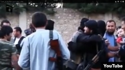 Kazakh fighters greet each other in the video.