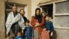 Kabir with his family outside their home in the Kart-i-Sei district of western Kabul