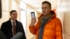 Father Of Navalny Associate Held On Criminal Charge