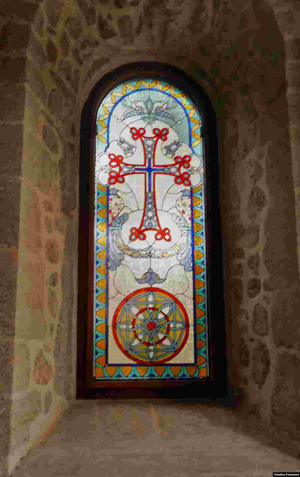 Light shines through a stained-glass window inside Kanach Zham. The church was built in 1818. 