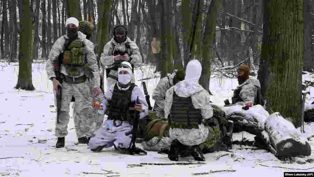 Members of Ukraine's Territorial Defense Forces train in a park in Kyiv on January 22.