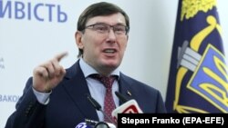 Ukrainian Prosecutor-General Yuriy Lutsenko speaks at a press conference in Kyiv on March 7.