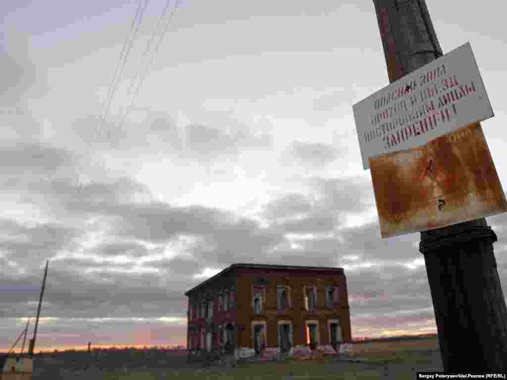The sign says "Danger Zone." An explosion on September 29, 1957, contaminated an area of 23,000 square kilometers and exposed more than 270,000 people to significant levels of radiation. 