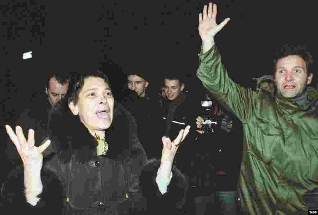 People gathered outside volunteer to take the place of the hostages.