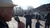 Opposition leaders address the demonstrators in Talas