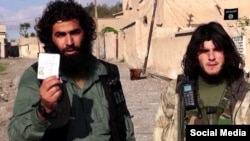 A photo of what pro-Islamic State social media claim is a member (left) of a predominantly Chechen IS faction in Syria and Iraq.