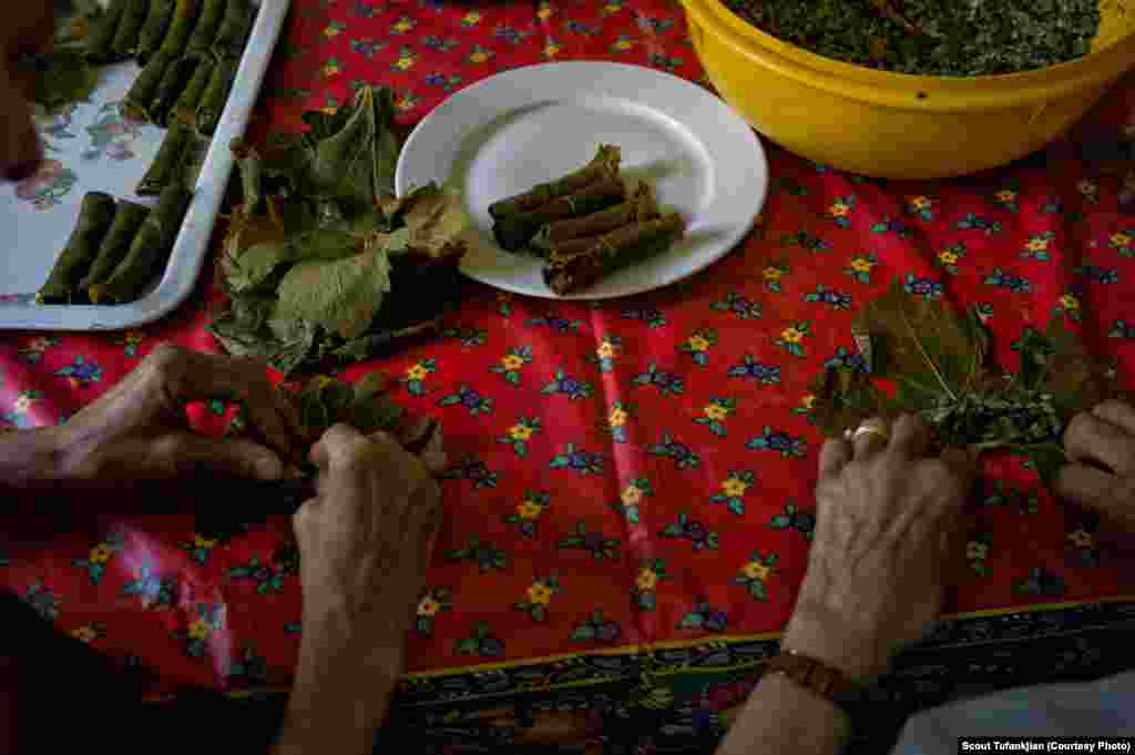 Rolling dolma, the classic stuffed grape leaves, in Paris. &quot;When I meet an Armenian, it&#39;s like we have been friends forever,&quot; says one Armenian living in France. &quot;And that, I do not feel it with anyone else. The connection is there right away, due to our ancestors and history.&quot;&nbsp; &nbsp;