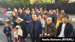Thousands of Moldovans also voted at polling stations around Europe, including these people in Paris.