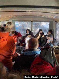 Young detainees in the police van where Markov was held.