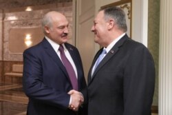 Belarusian President Alyaksandr Lukashenka (left) meets with U.S. Secretary of State Mike Pompeo in Minsk on February 1.