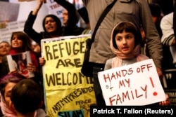 People protest against U.S. President Donald Trump's travel ban at LAX airport in Los Angeles on January 28.