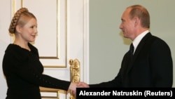 Тодішні прем'єр-міністри України і Росії, Юлія Тимошенко та Володимир Путін. Москва, 17 січня 2009 року