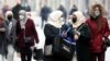 In The Balkans' Most Divided Country, COVID Vaccine Cuts Both Ways