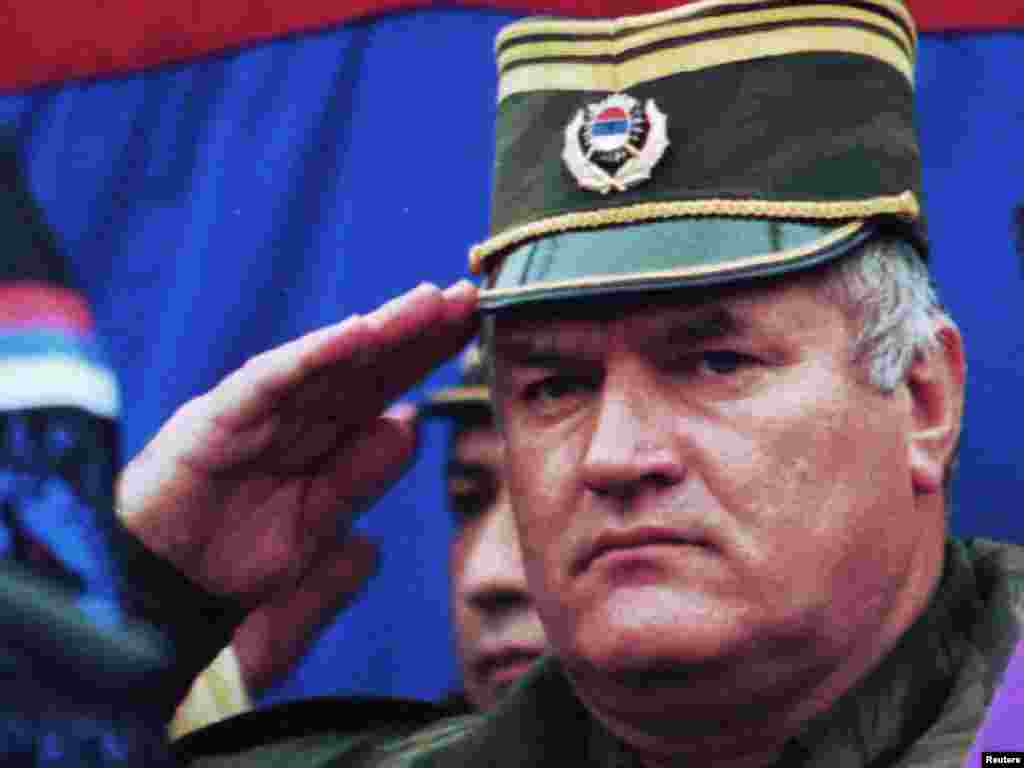 Mladic salutes during the promotion of a new unit "The Drina Wolfe" in Vlasenica, northeast of Sarajevo, on December 2, 1995.