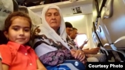 Earlier this month, Tajik authorities removed 10-year-old Fatima Davlatova (left) and her grandmother (right) from an international flight just before takeoff. 