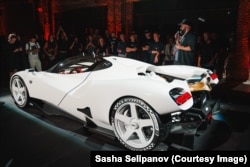 Sasha Selipanov (right) unveils the Nilu27 hypercar.