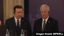 U.S. Senators Chris Murphy (left) and Ron Johnson hold a press conference in Belgrade after meeting with Serbian President Aleksandar Vucic on September 6.